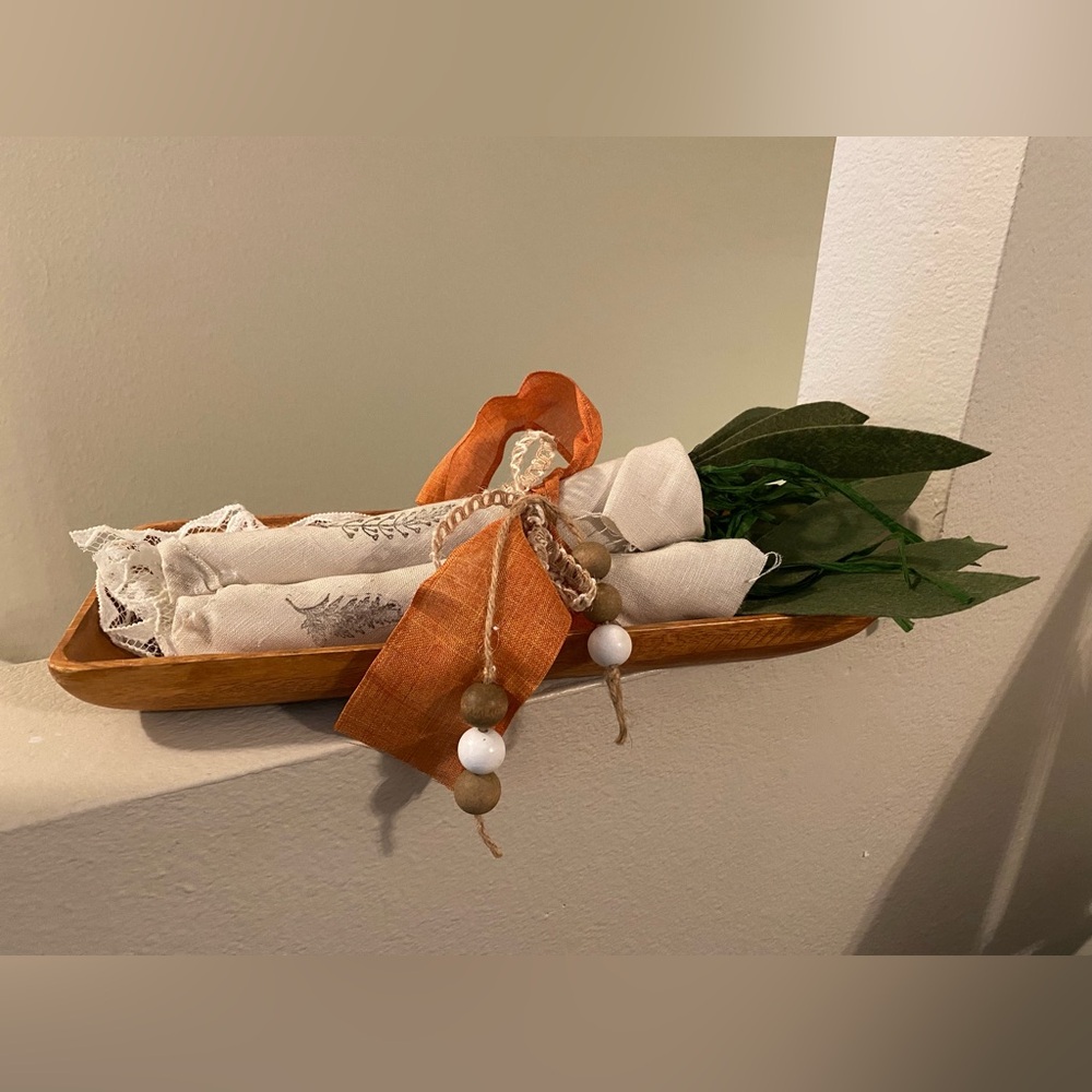 Decorative Carrots Lying in Wood Bowl. . Carrots not Attached to Tray.